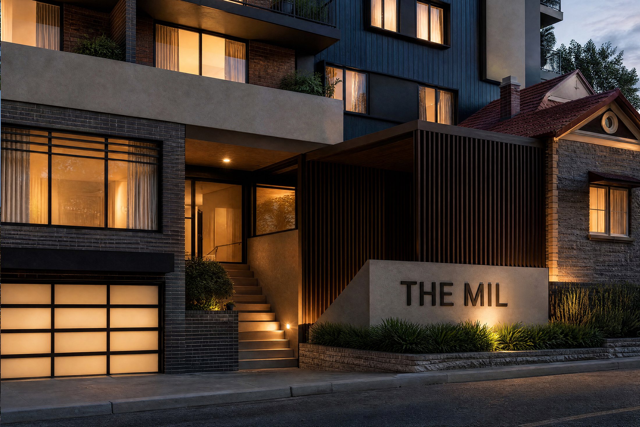 The Mil entry at dusk with THE MIL signage